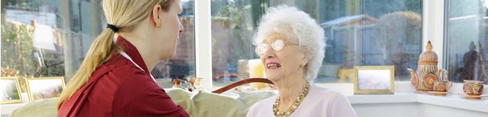 caregiver with her elderly